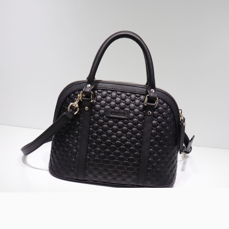 G*u*i top handle bags